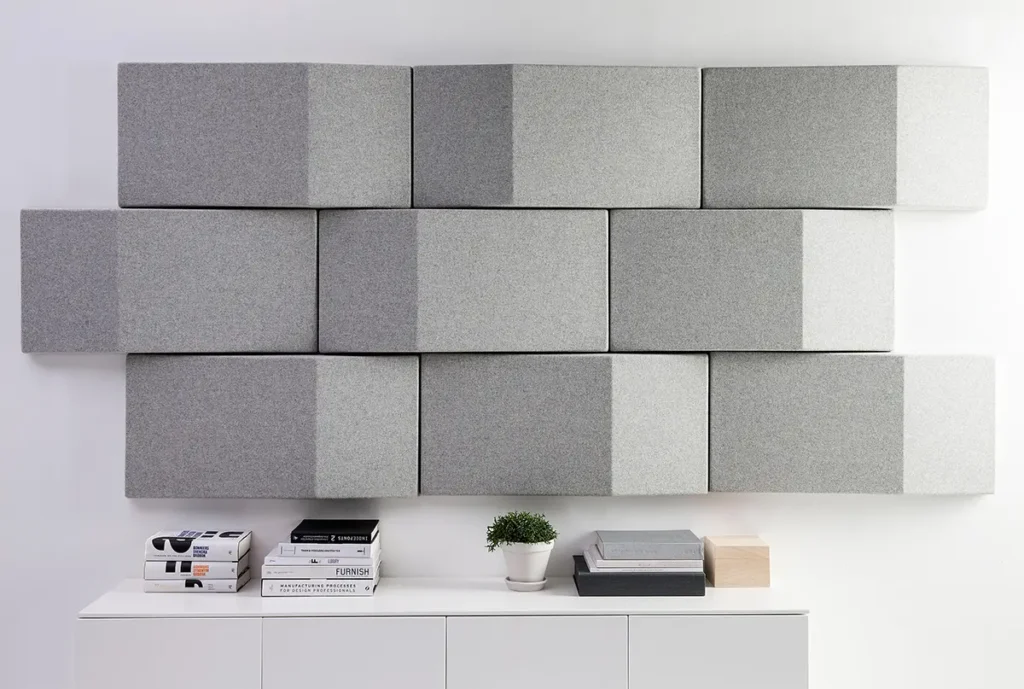 Fabric acoustic wall panels installed in a modern luxury interior