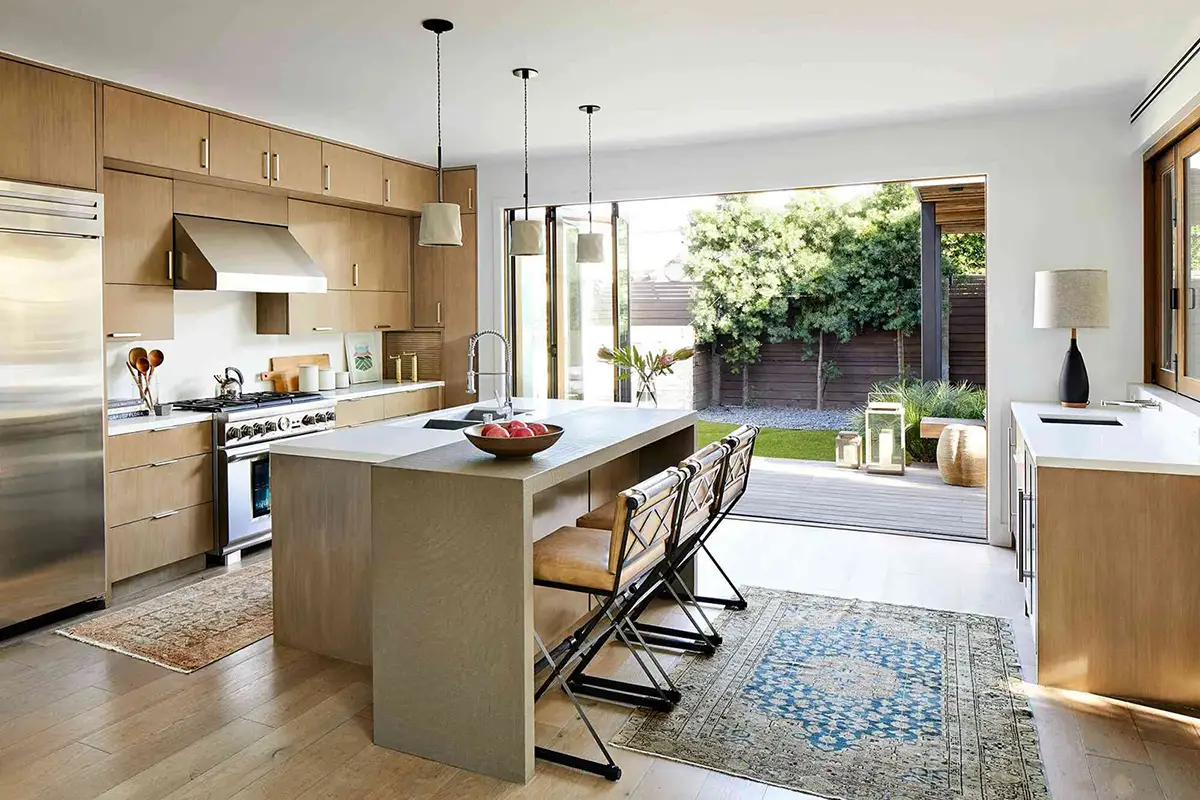Modern compact kitchen in a 3 bedroom house with open floor plan