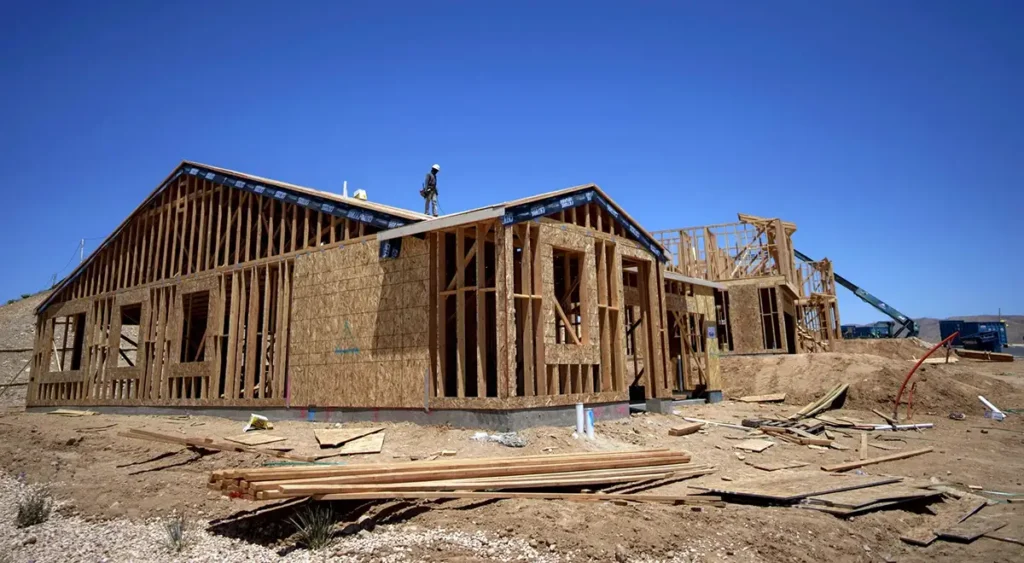 New house under construction with wood framing