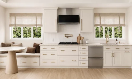 Minimal white kitchen layout with natural lighting and custom cabinetry