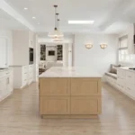 Bright open-concept kitchen layout with large island and natural light in a modern California home