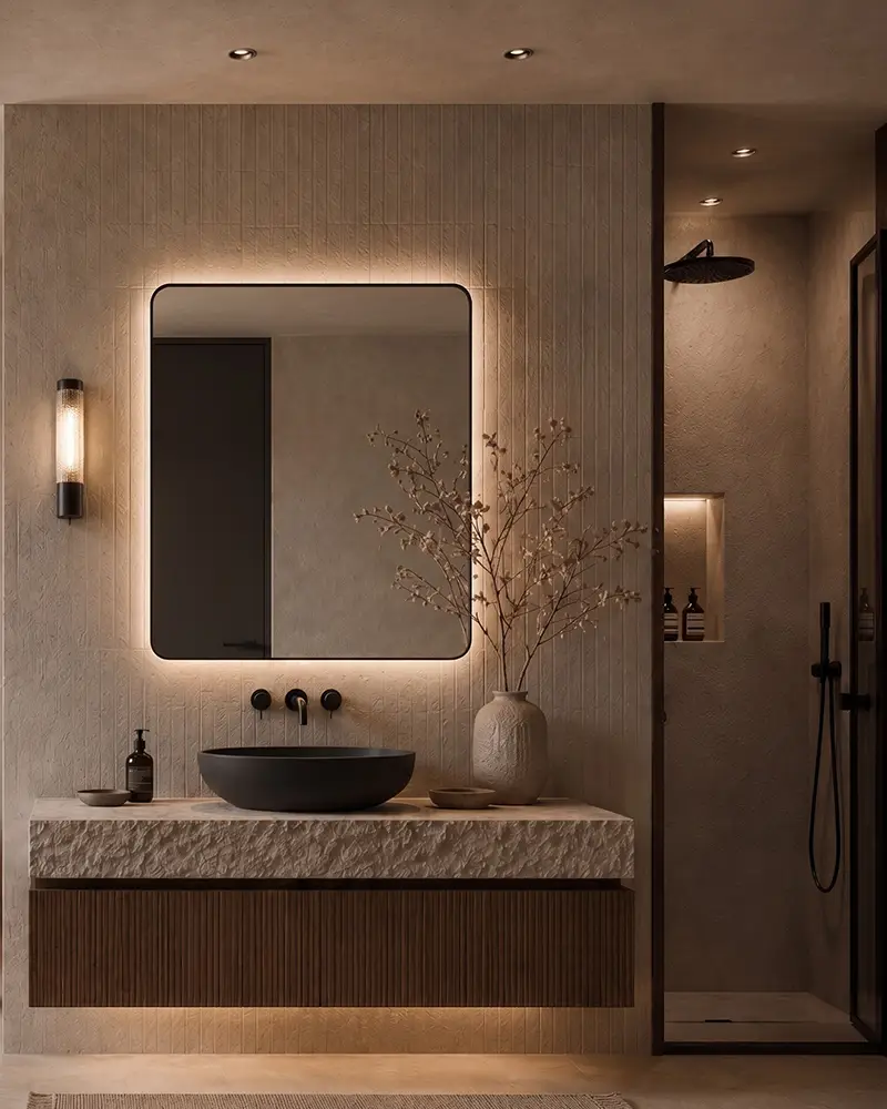Modern bathroom vanity with illuminated mirror and walk-in shower