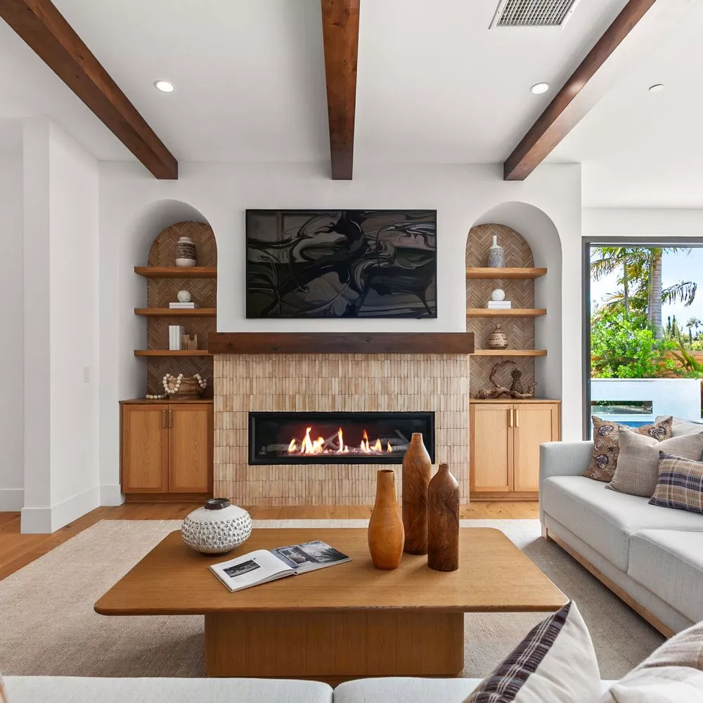 Living room with fireplace and custom details in a West Hollywood home