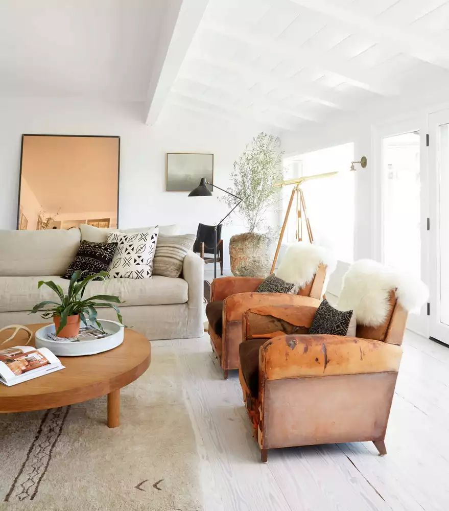 Modern living room in West Hollywood with natural light and warm textures