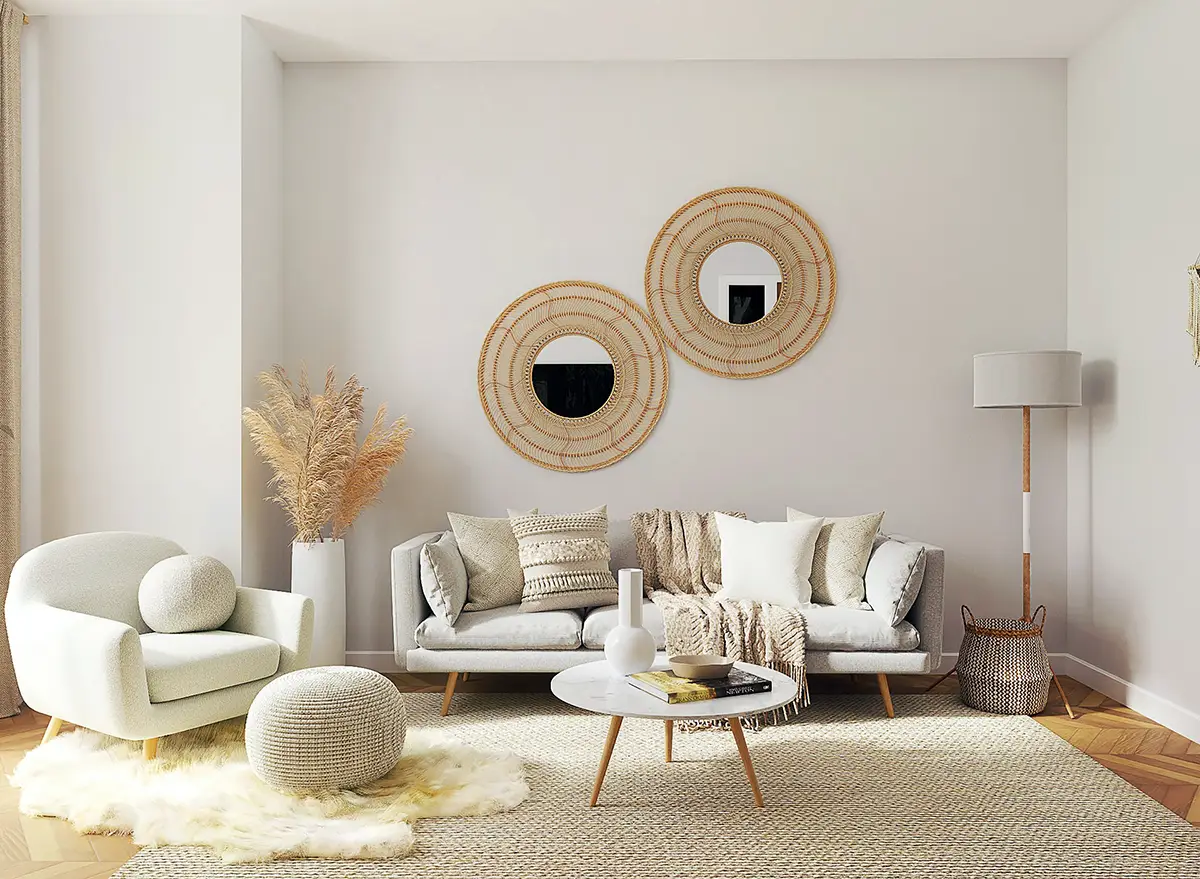 Neutral-toned living room with sofa, woven decor, and minimalist styling.