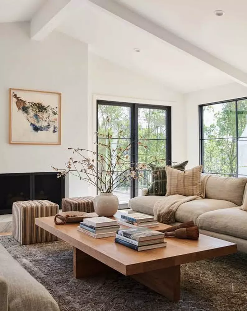 Bright contemporary living space with fireplace
