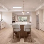Open-concept kitchen with island and exposed ceiling beams